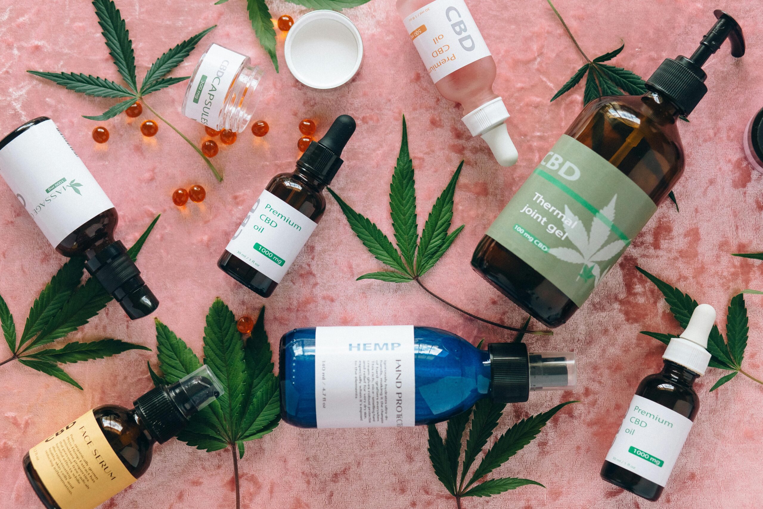 A selection of premium CBD skincare products displayed on a wooden surface, highlighting their natural ingredients and benefits.